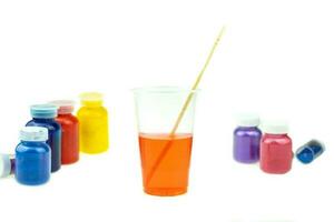 Mixing color epoxy resin in plastic cup photo