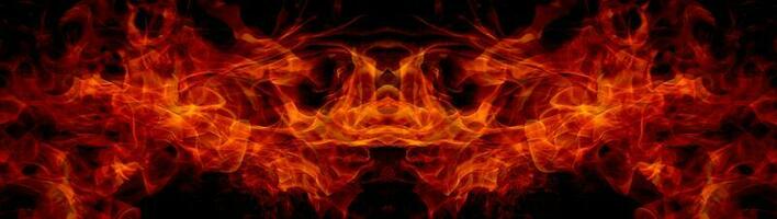 Fire flames on abstract art black background, burning red hot sparks rise, fiery orange glowing flying particles photo