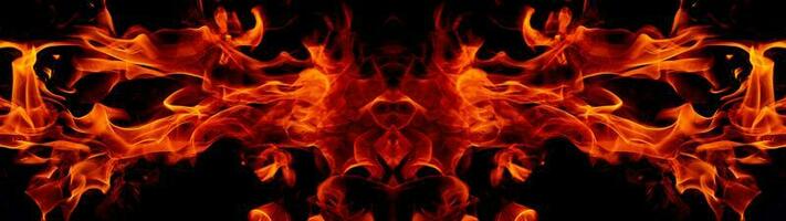 Fire flames on abstract art black background, burning red hot sparks rise, fiery orange glowing flying particles photo