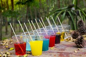 Epoxy resin in cup for casting stabilizing wood photo