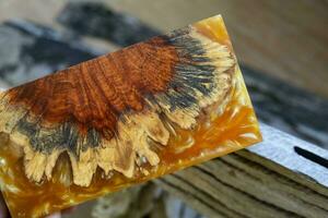 Epoxy resin tabilizing Afzelia burl exotic wood photo