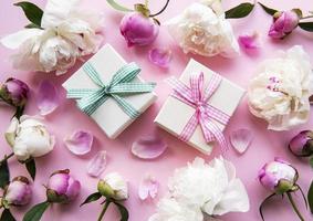 Peonies and gift boxes photo