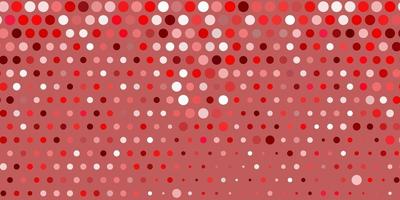 Light pink, red vector backdrop with dots.