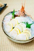 Raw and fresh sashimi set with hotate oyster and prawn or shrimp photo