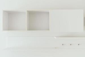 Empty White wooden shelves photo