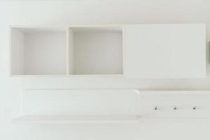 Empty White wooden shelves photo