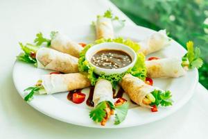 Duck meat inside spring roll photo