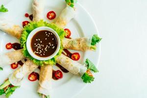 Duck meat inside spring roll photo
