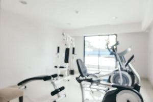 Abstract blur fitness equipment in gym photo