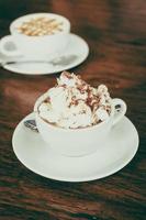 Hot marshmallow chocolate in white cup