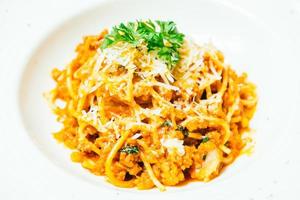 Spaghetti or pasta bolognese in white plate photo