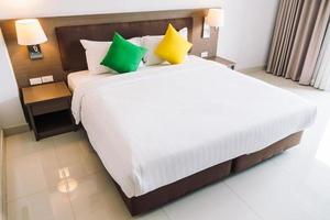 Comfort pillow on bed decoration interior photo