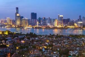 Skyline of Xiamen in China at night photo