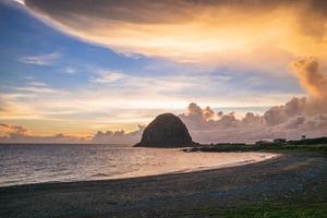 scenery of Mantou Rock located in Lanyu at dusk photo