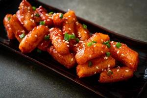 Deep-fried Korean rice cake, or Tteokbokki, with spicy sauce - Korean food style photo