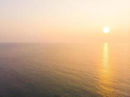 Aerial view sunrise with sea photo