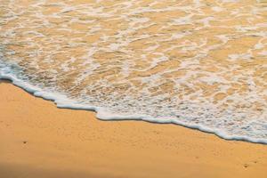 Beautiful beach and sea on sunrise time photo