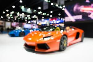 Abstract blur and defocused car and motor exhibition show photo