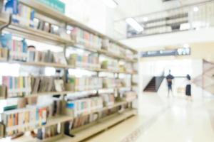 Abstract blur and defocused bookshelf in library photo