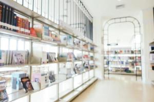 Abstract blur and defocused bookshelf in library photo