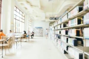 Abstract blur and defocused bookshelf in library photo