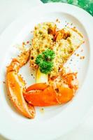 Grilled lobster with butter and garlic photo