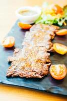 Grilled beef meat steak with vegetable photo