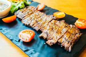 Grilled beef meat steak with vegetable photo