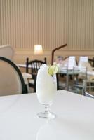 Fresh lemon-lime smoothie glass in cafe and restaurant photo