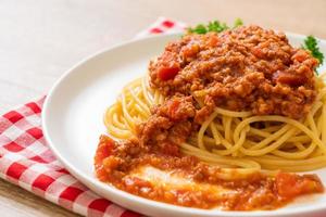 Spaghetti bolognese pork or spaghetti with minced pork tomato sauce - Italian food style photo