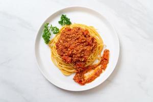 Spaghetti bolognese pork or spaghetti with minced pork tomato sauce - Italian food style photo