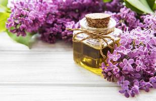 Spa oil with lilac flowers