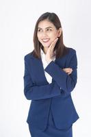 Woman in blue suit is smiling on white  background photo