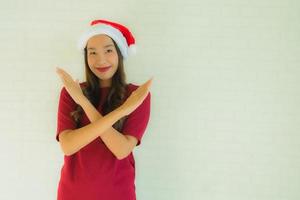 Portrait beautiful young asian women wearing santa hat for celebration in christmas photo