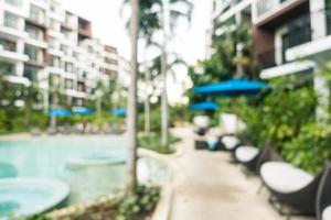 Abstract blur and defocused swimming pool in hotel and resort photo