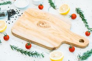 Empty wooden cutting board photo