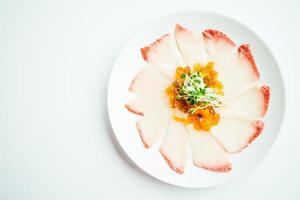 Raw fresh Hamaji fish meat sashimi in white plate photo