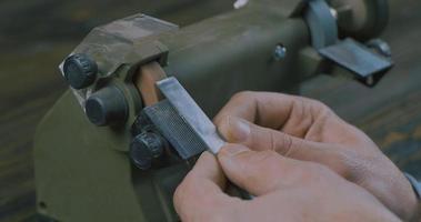 Sharpening A Chisel On Grinding Machine video