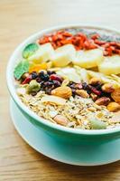 Mixed fruit with muesli and granola photo