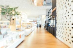 Abstract blur and defocused library and book store shop interior photo