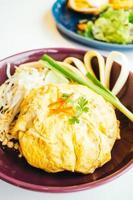 Egg wrap pad thai noodle photo