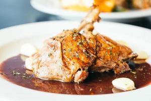 Duck breast steak in white plate photo