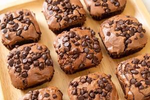 Dark chocolate brownies with chocolate chips on top photo