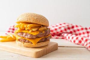 Pork hamburger or pork burger with cheese and french fries