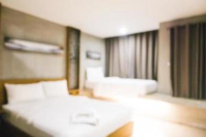 Abstract blur and defocused decoration in hotel bedroom interior photo