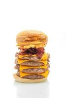 Pork hamburger or pork burger with cheese, bacon, and french fries isolated on white background photo