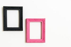 Empty picture frame on white wall background with copy space photo