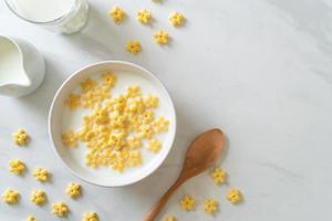 Whole grain cereals with fresh milk for breakfast photo