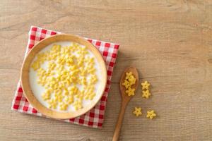 Whole grain cereals with fresh milk for breakfast photo