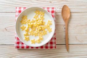 Whole grain cereals with fresh milk for breakfast photo